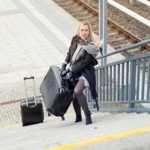 carrying heavy suitcase
