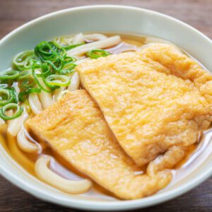 Kitsune udon (udon soup with deep-fried tofu)
