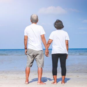 Elderly couple visiting the sea